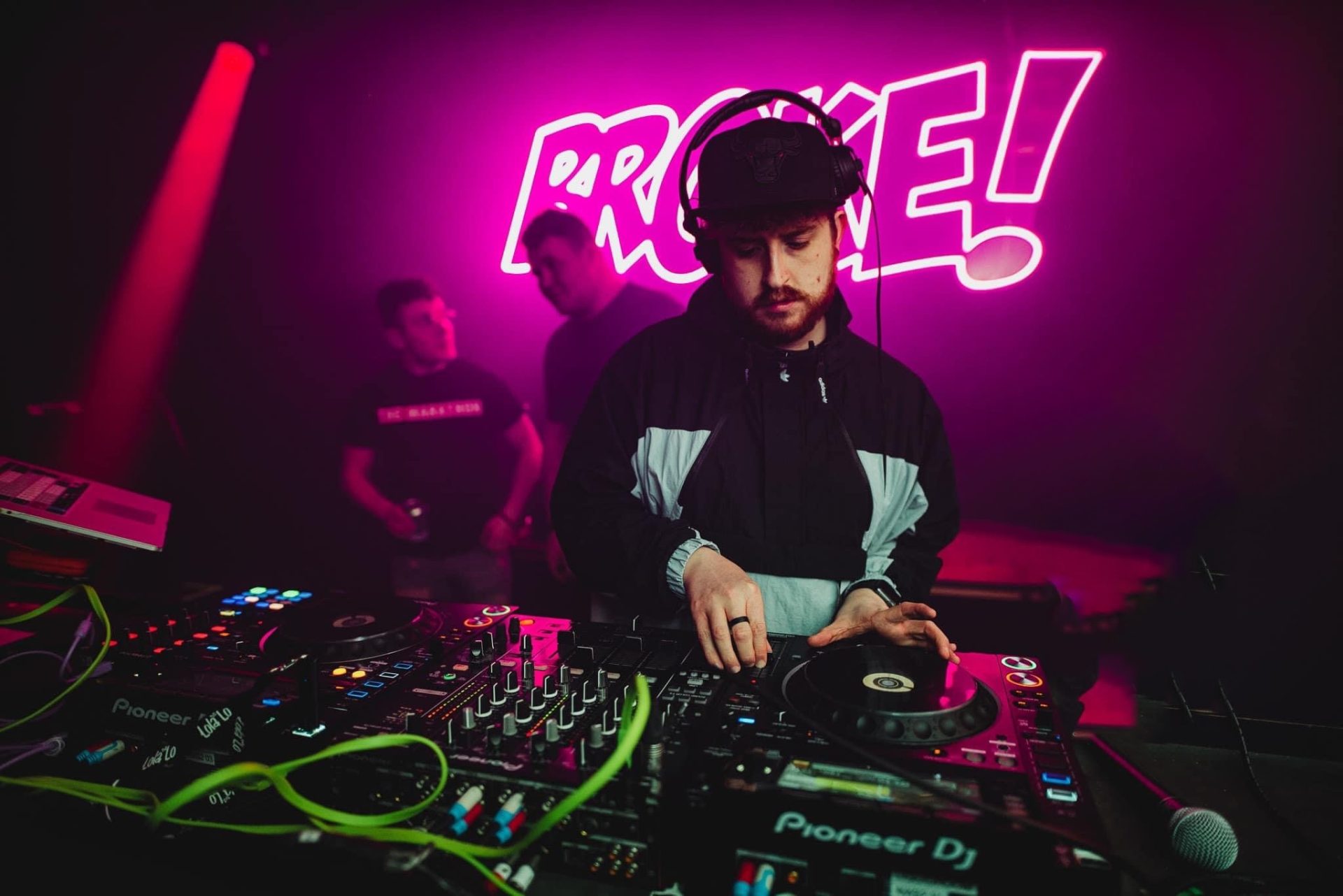 DJ performing in nightclub setting